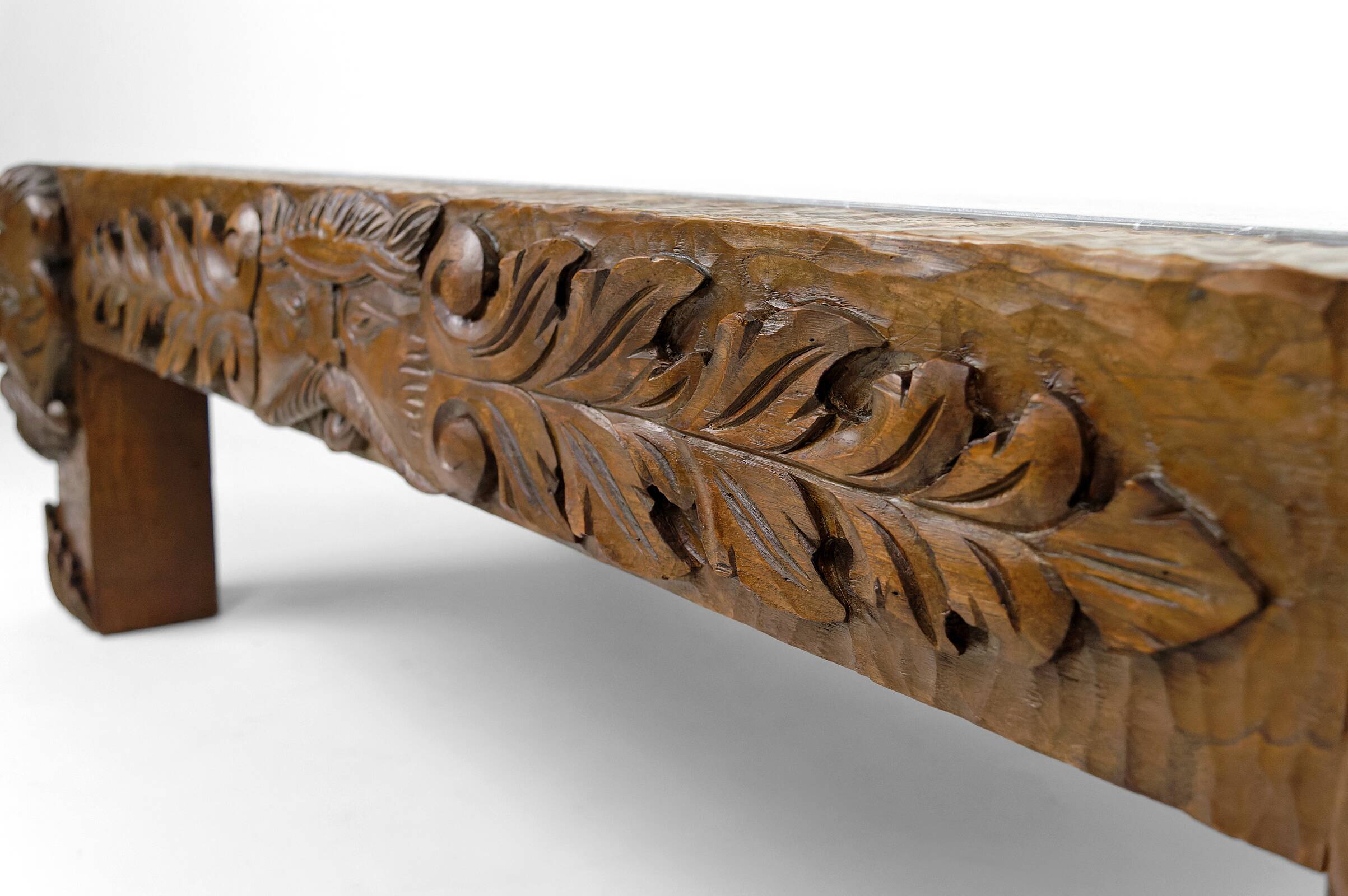 Solid oak coffee table carved with fauns and gray marble top, France, circa 1940