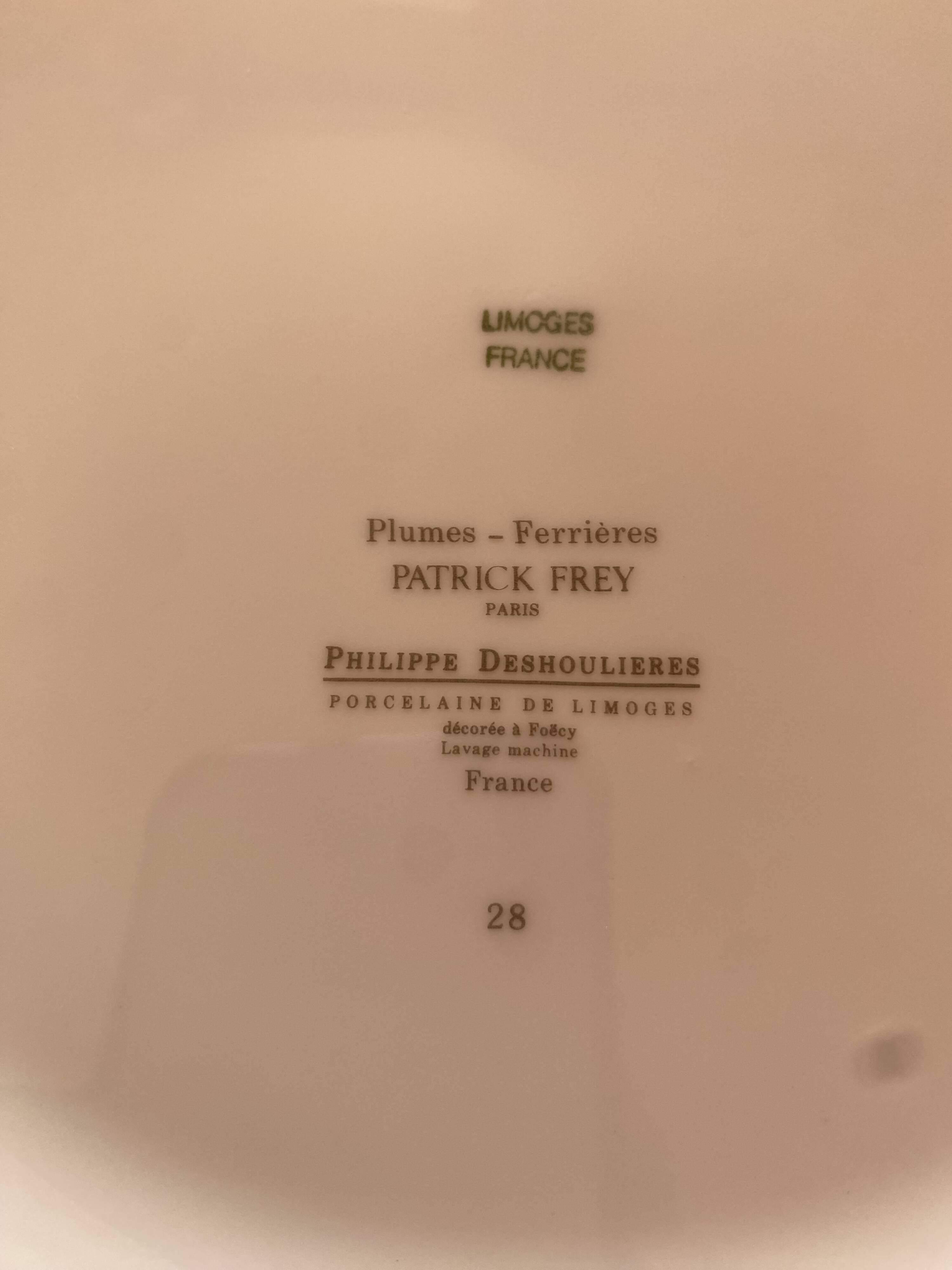 Porcelain plate with feather decoration
