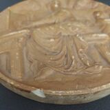 Tondo medallion in patinated plaster, woman and putti, late 19th century