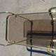 Golden metal and smoked glass dessert table