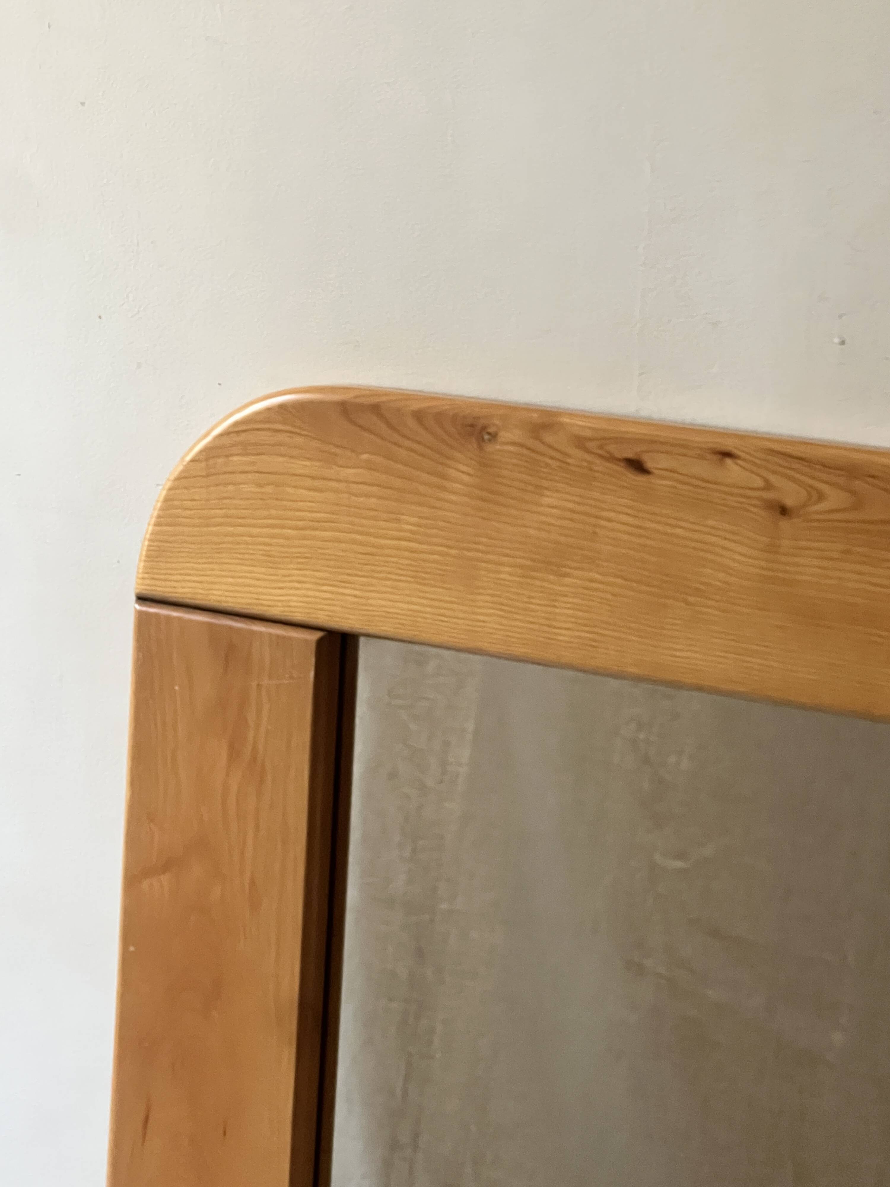 Large oak mirror in the style of a revival house, 1970s design.