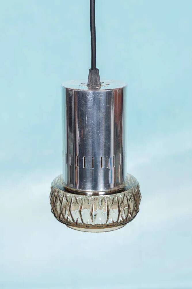Suspended glass from the space age, mid-century glass from the 1960s.
