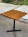 Square bistro table with a wooden central leg Werzalit Bordeaux - France