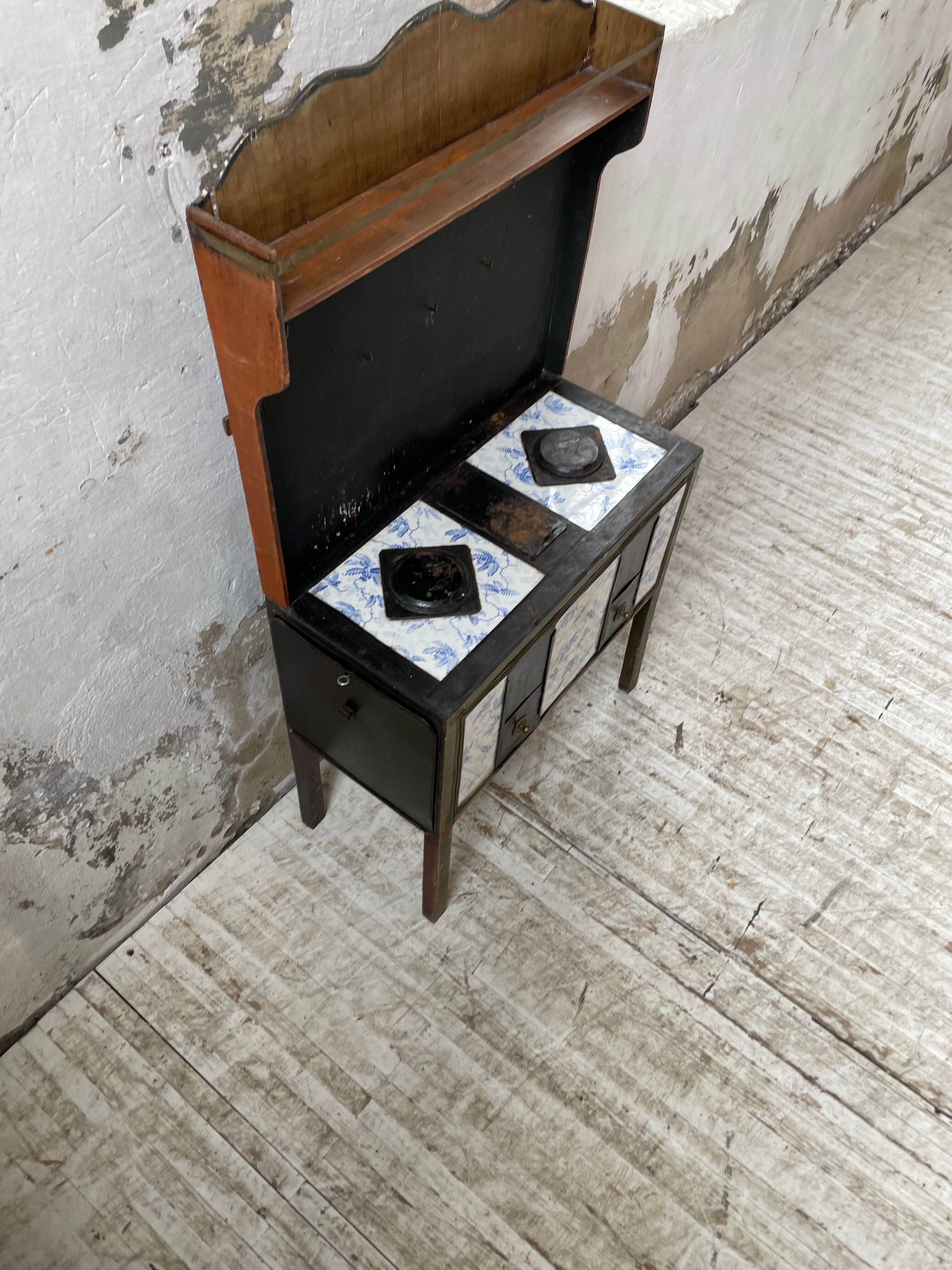 Children's toy stove antique