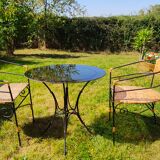 Garden table and wrought iron chair