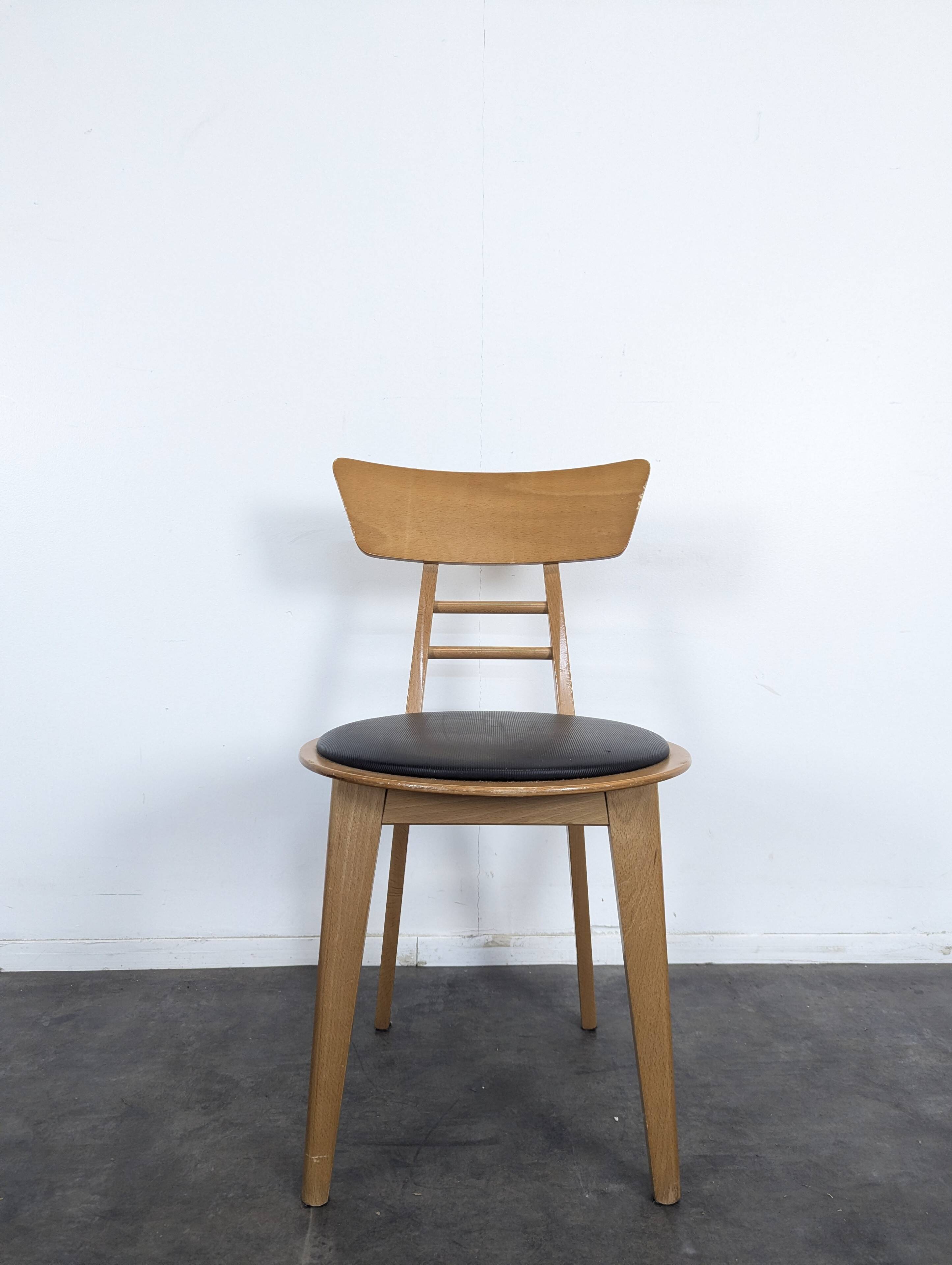 Set of 6 chairs published by Ton.