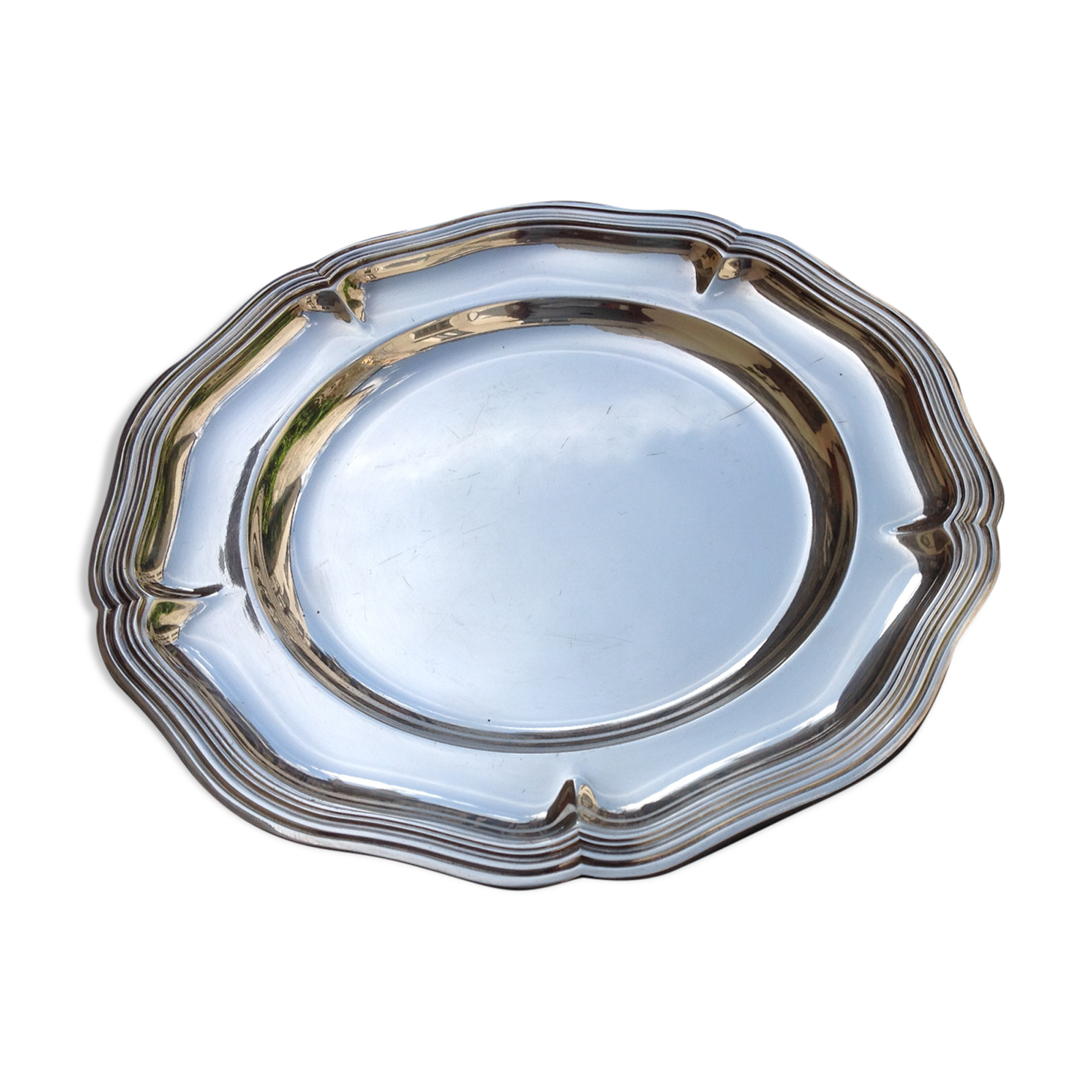 Silver metal dish with twisted edges