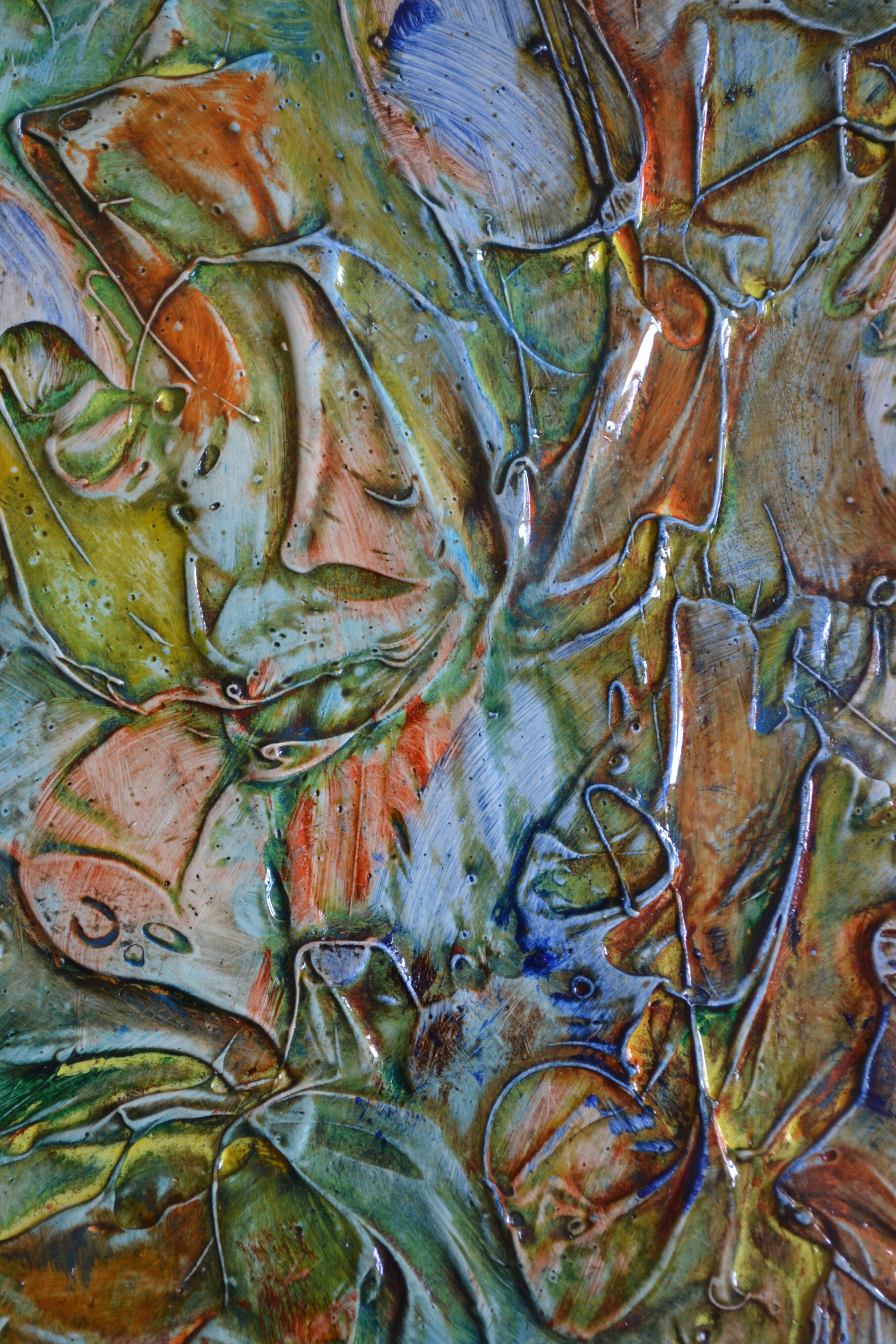 Framed abstract painting under glass