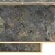 Marble glass coffee table with "solar eruption" decor.