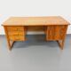 Vintage sled leg pine executive desk from the 60s-70s