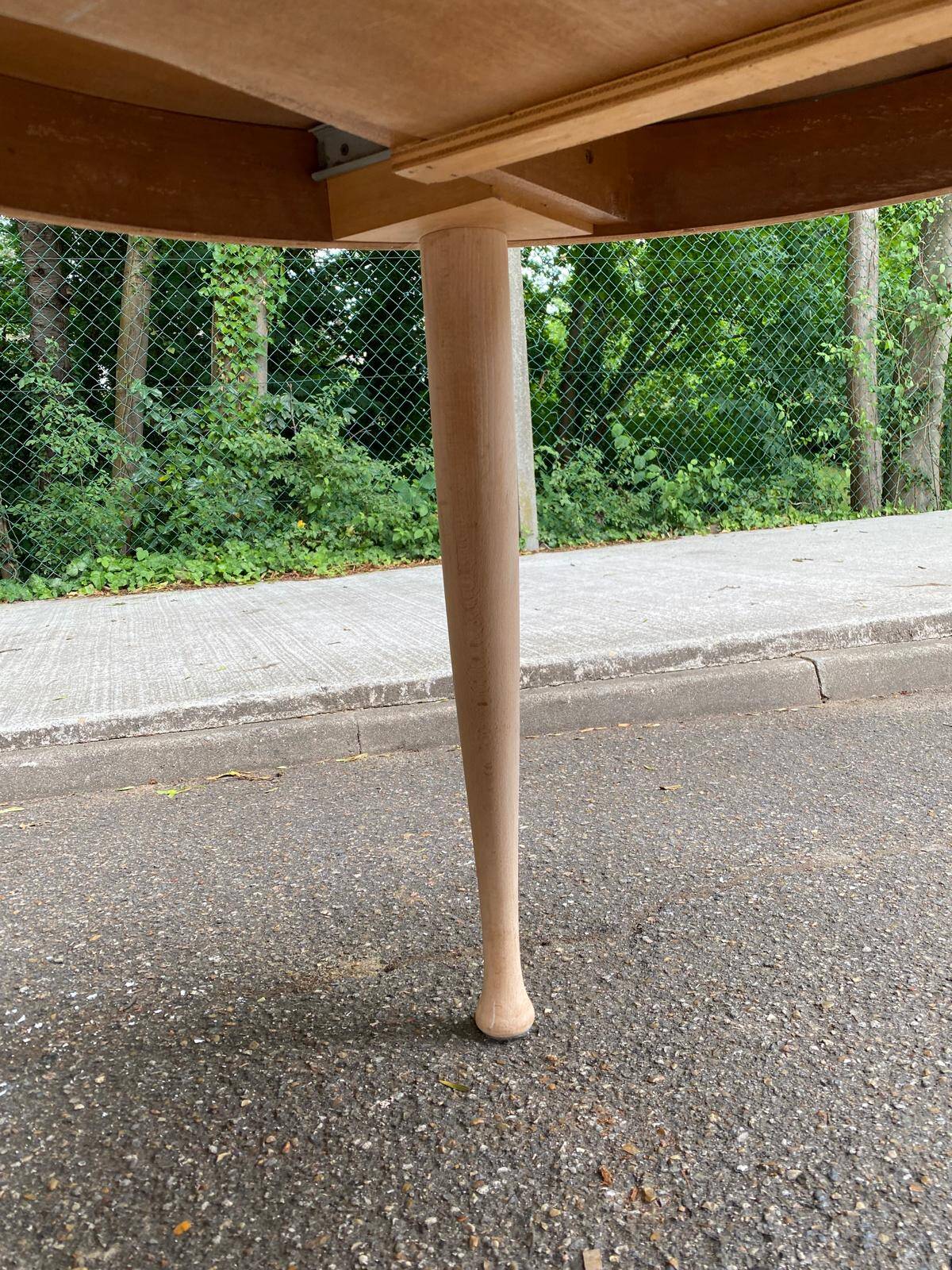 Renovated round extendable Scandinavian dining table in teak, 110cm.