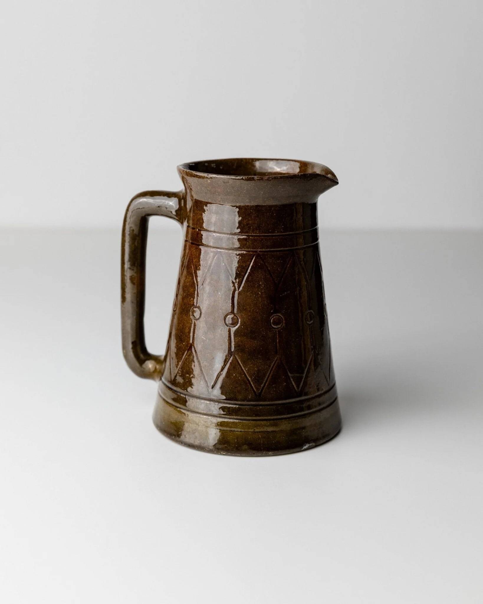 Vintage ceramic pitcher or vase with handle by Urbano Fontana, relief, brown glaze, Italy 1970s.