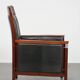 Black cowhide leather and wooden Art Deco design armchair