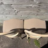 Pair of cerused chairs with fabric seats and caned backs.