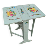 Antique Scandinavian table with bohemian country decor and hand-painted decor