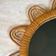Rattan mirror representing a sun