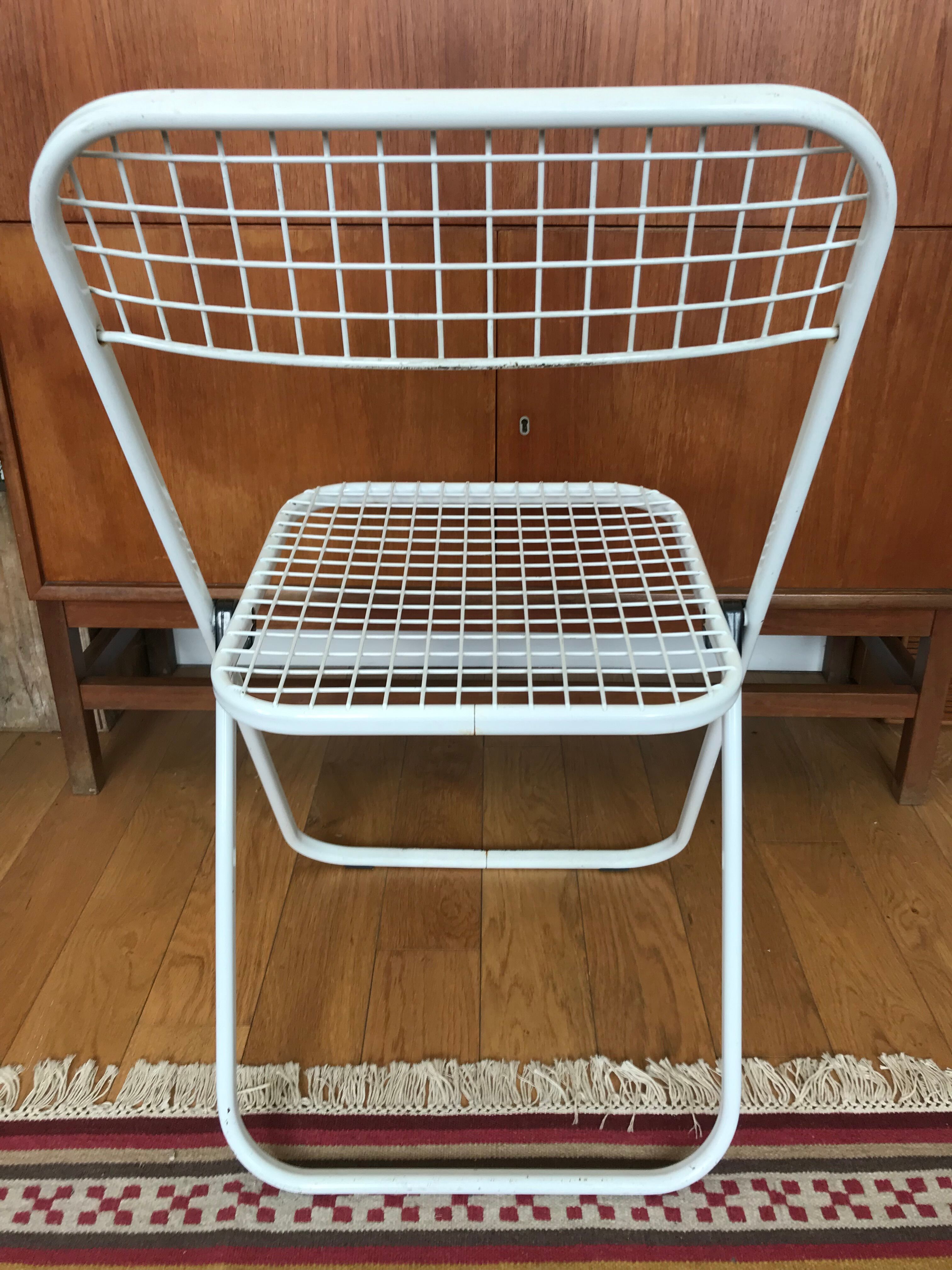 Metal folding chair by Talin Editions