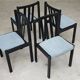 Set of 4 modernist black chairs with light blue ribbed fabric