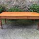 Antique Louis Philippe style farmhouse table in solid cherry wood with its 2 extensions.