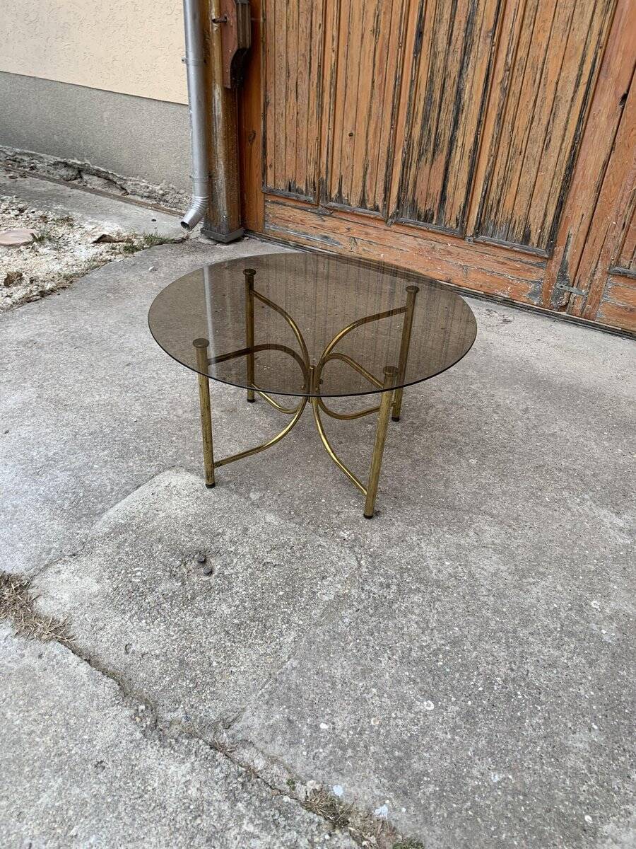 Vintage round coffee table in gilded brass with a glass top - 1970s
