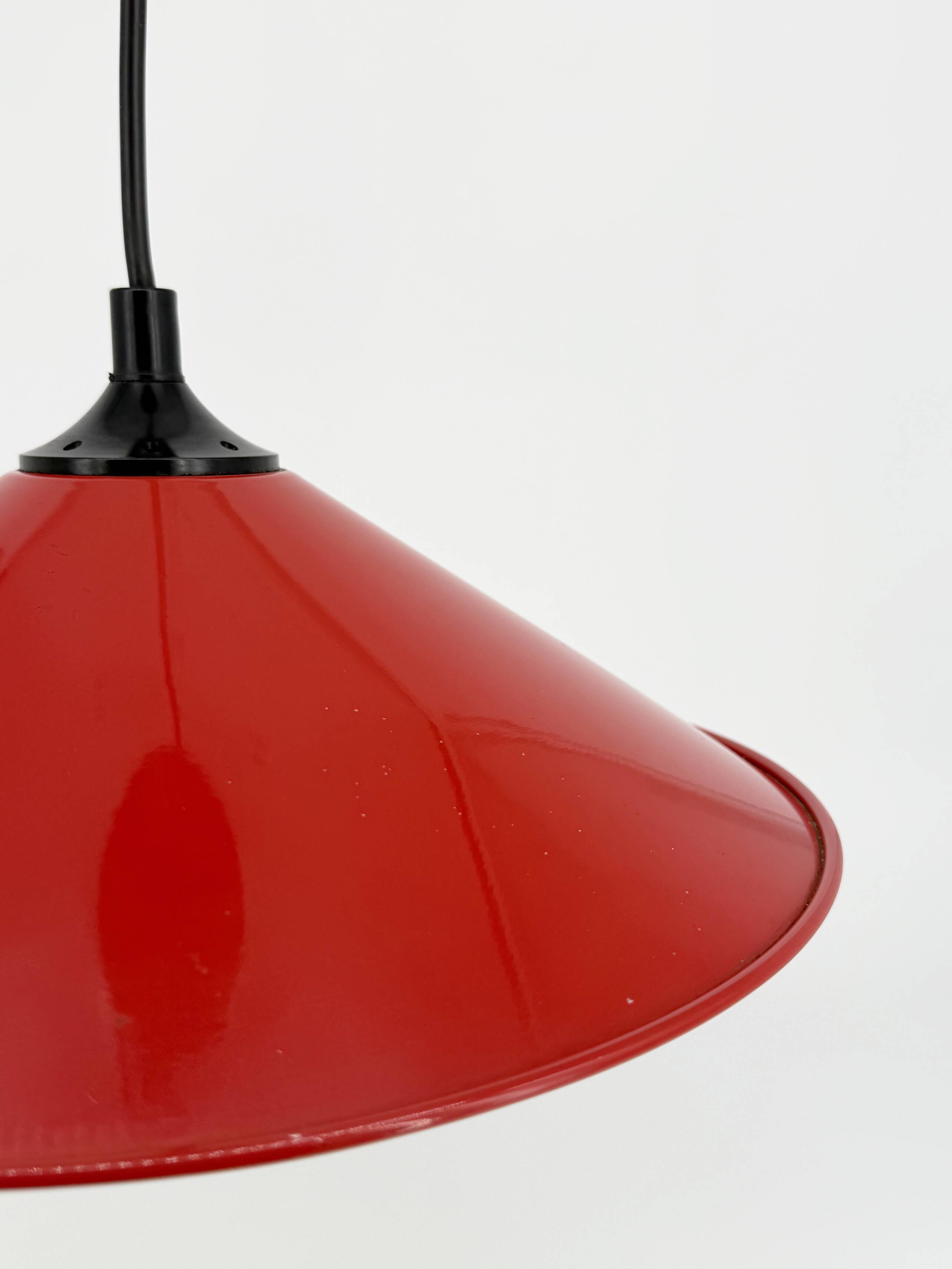 Red conical pendant light in enamelled metal