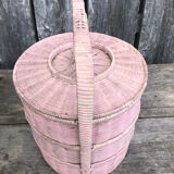Old vintage pink rattan worker basket