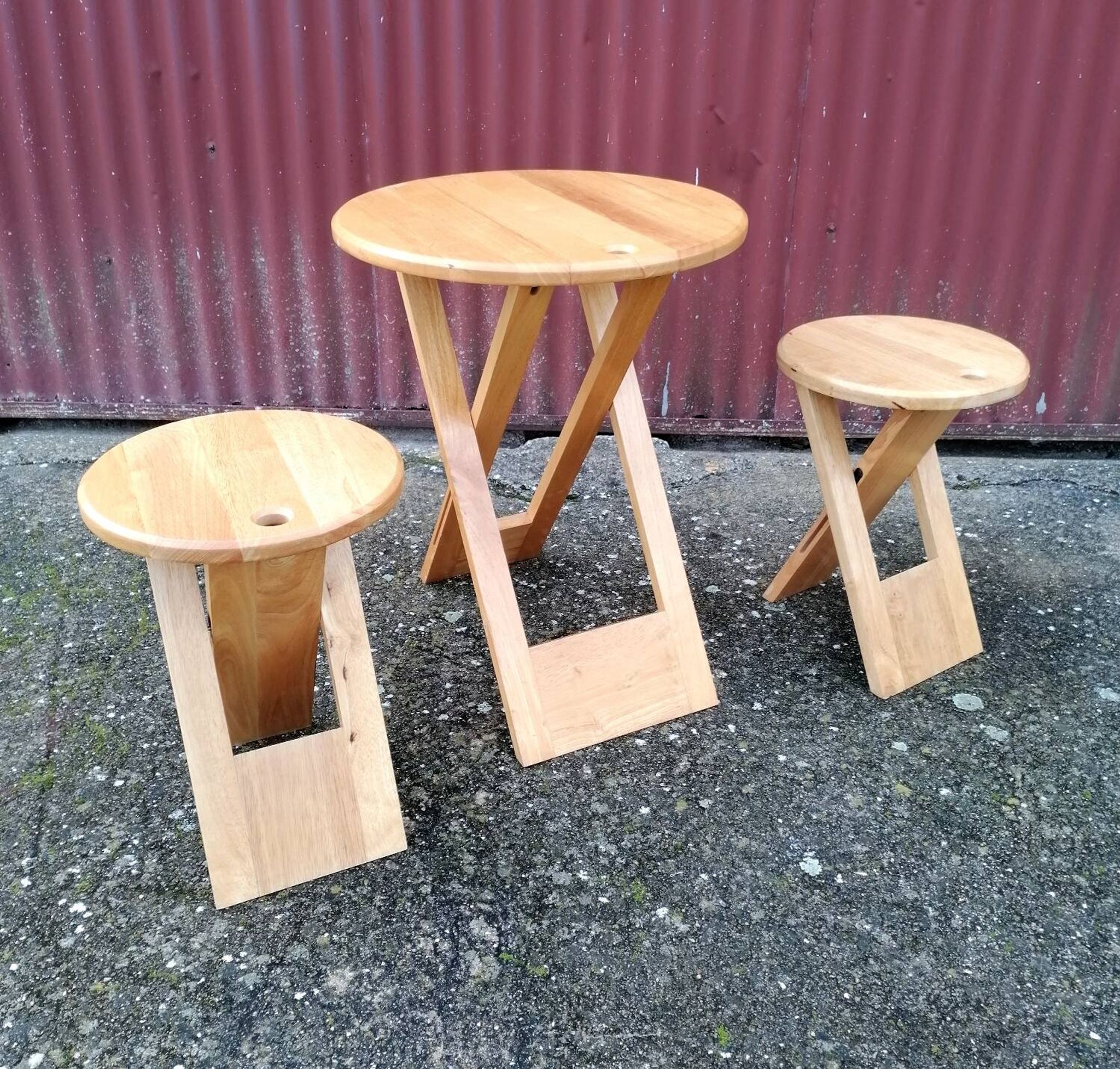 Lot table and folding stools Suzy by Adrian Reed.