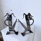 Paire de chenets zoomorphes métal « chiens » 1950