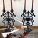 Black cast iron candlesticks, early 20th century, Neo-Rococo