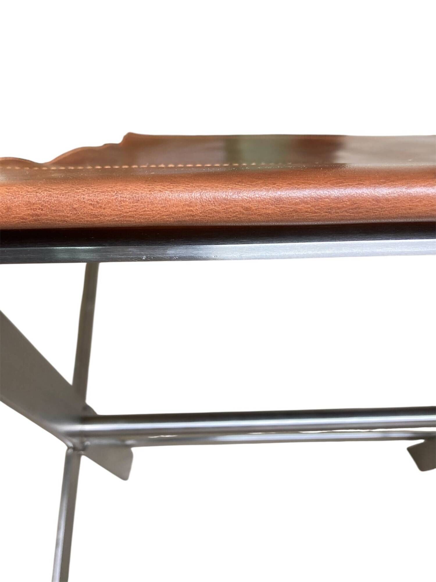 FOLDING STOOL KNOWN AS "PLOYANT" IN BRUSHED STEEL AND LEATHER, SIGNED AMAURY WATINE
