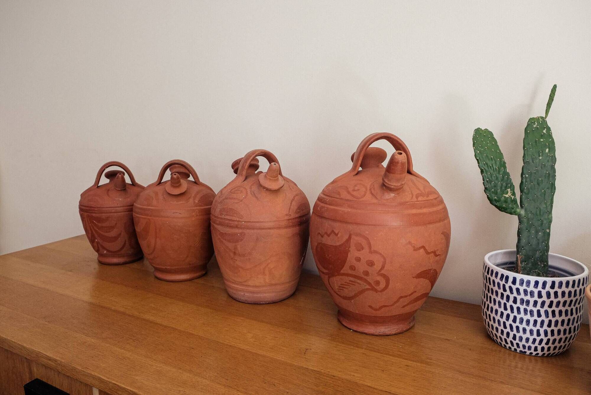 Set of 4 terracotta jugs