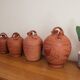 Set of 4 terracotta jugs