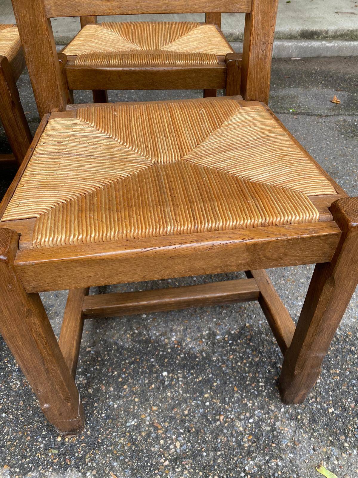4 solid oak dining chairs with farmhouse straw