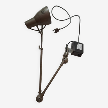 Old industrial articulated workshop lamp