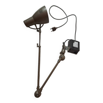 Old industrial articulated workshop lamp