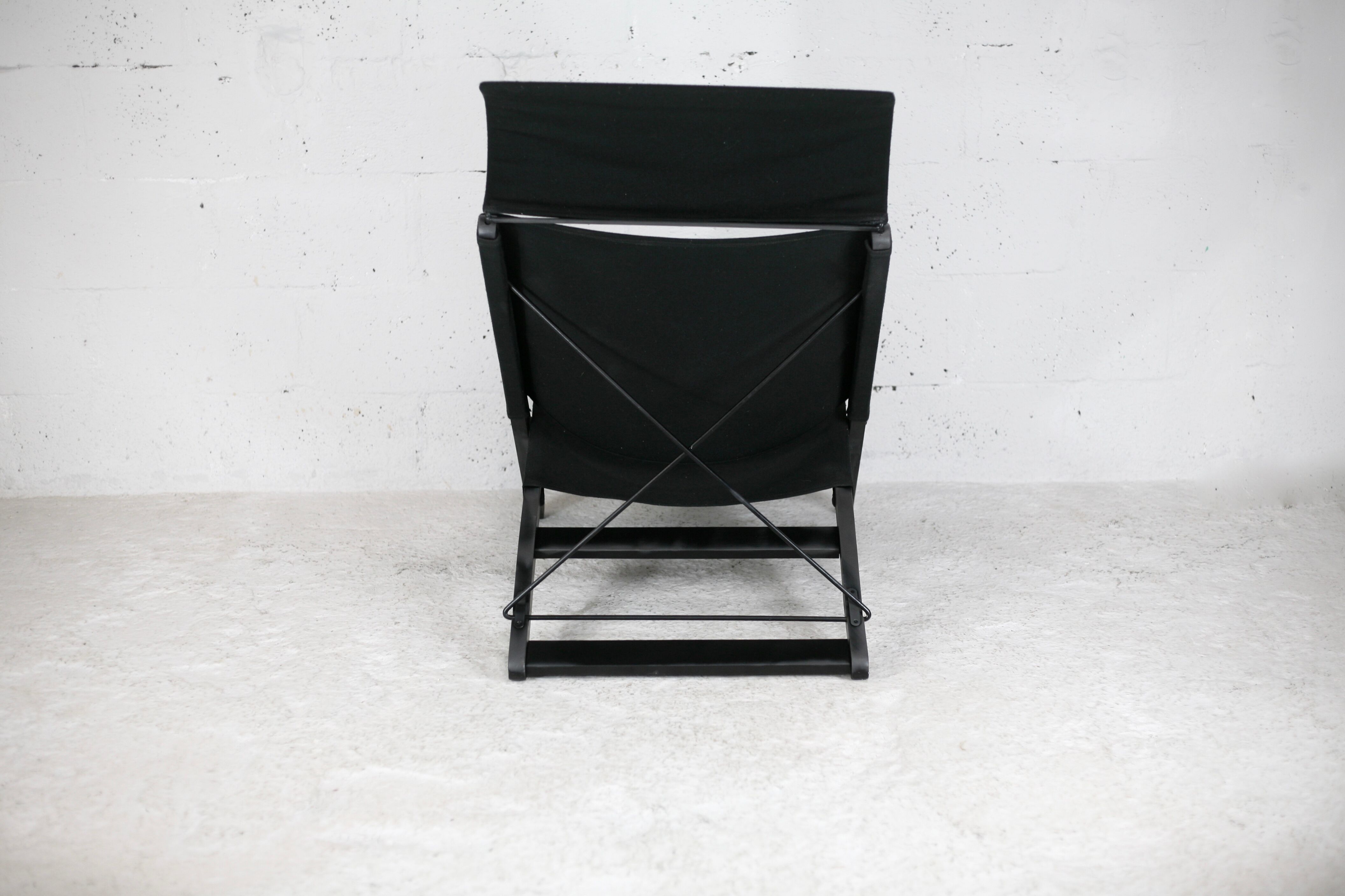 Armchair by Tord Bjorklund, black wood, steel and canvas. Ed. Ikéa, circa 1990.