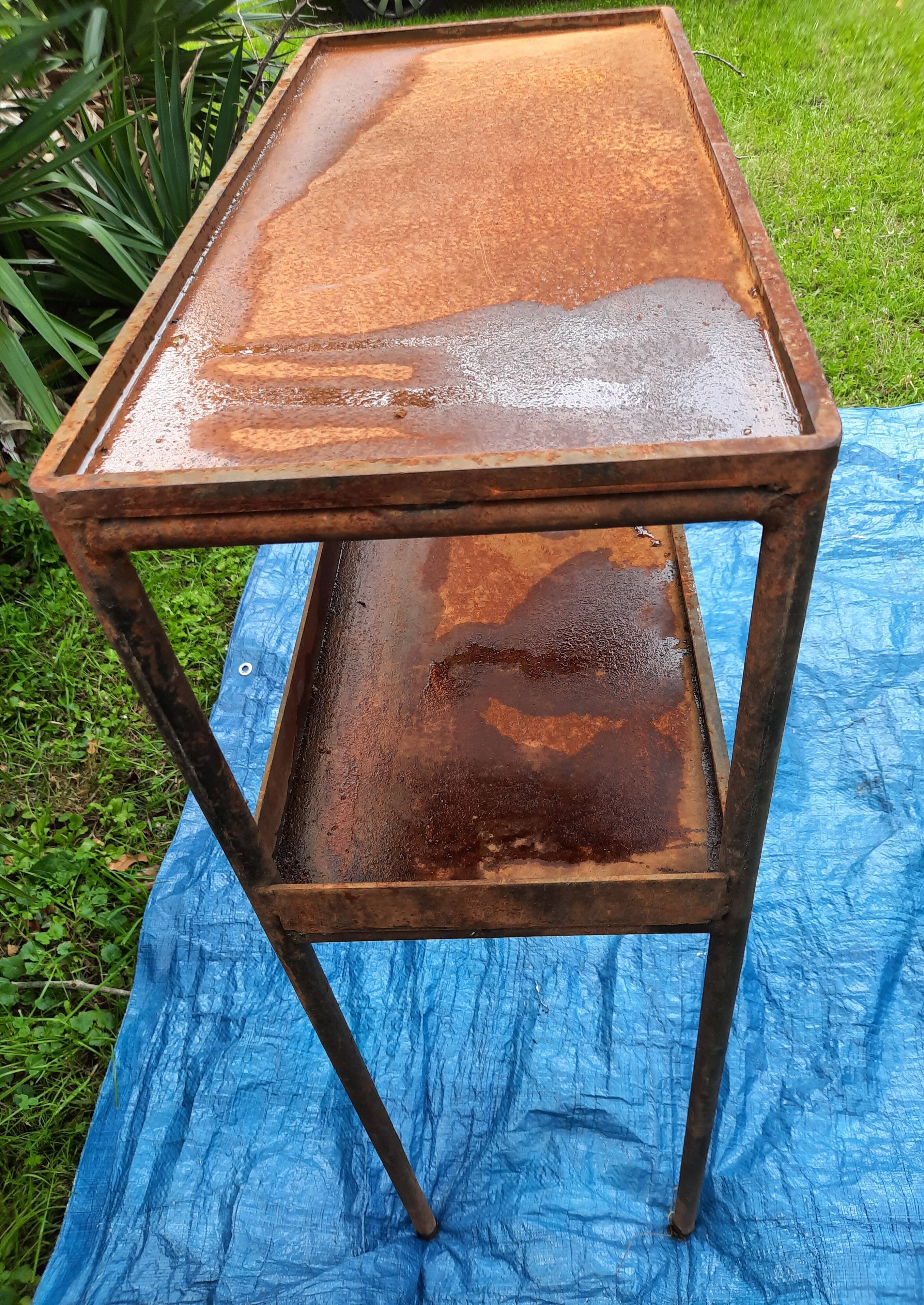 Pair of metal consoles