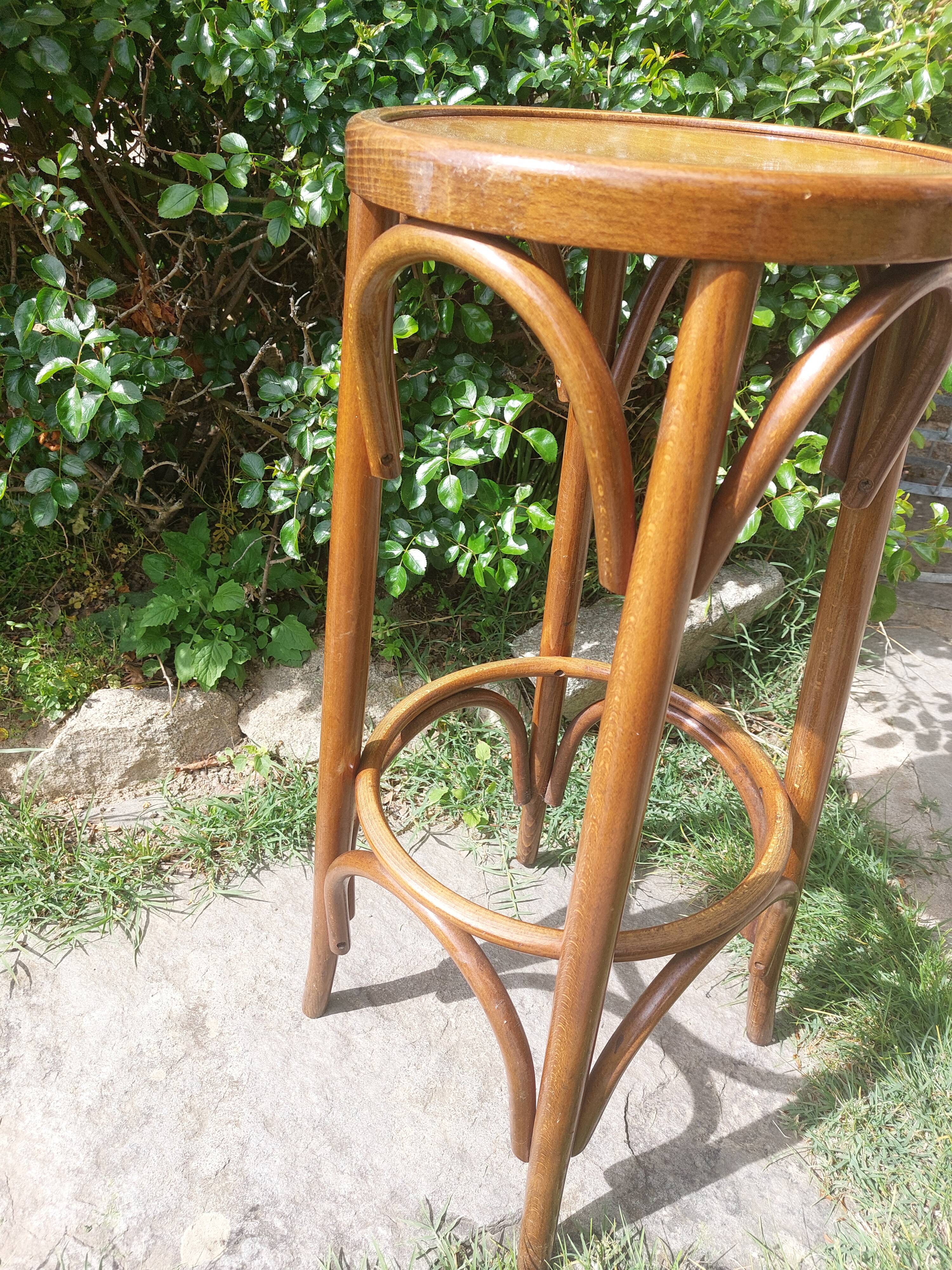 curved wooden bar stool