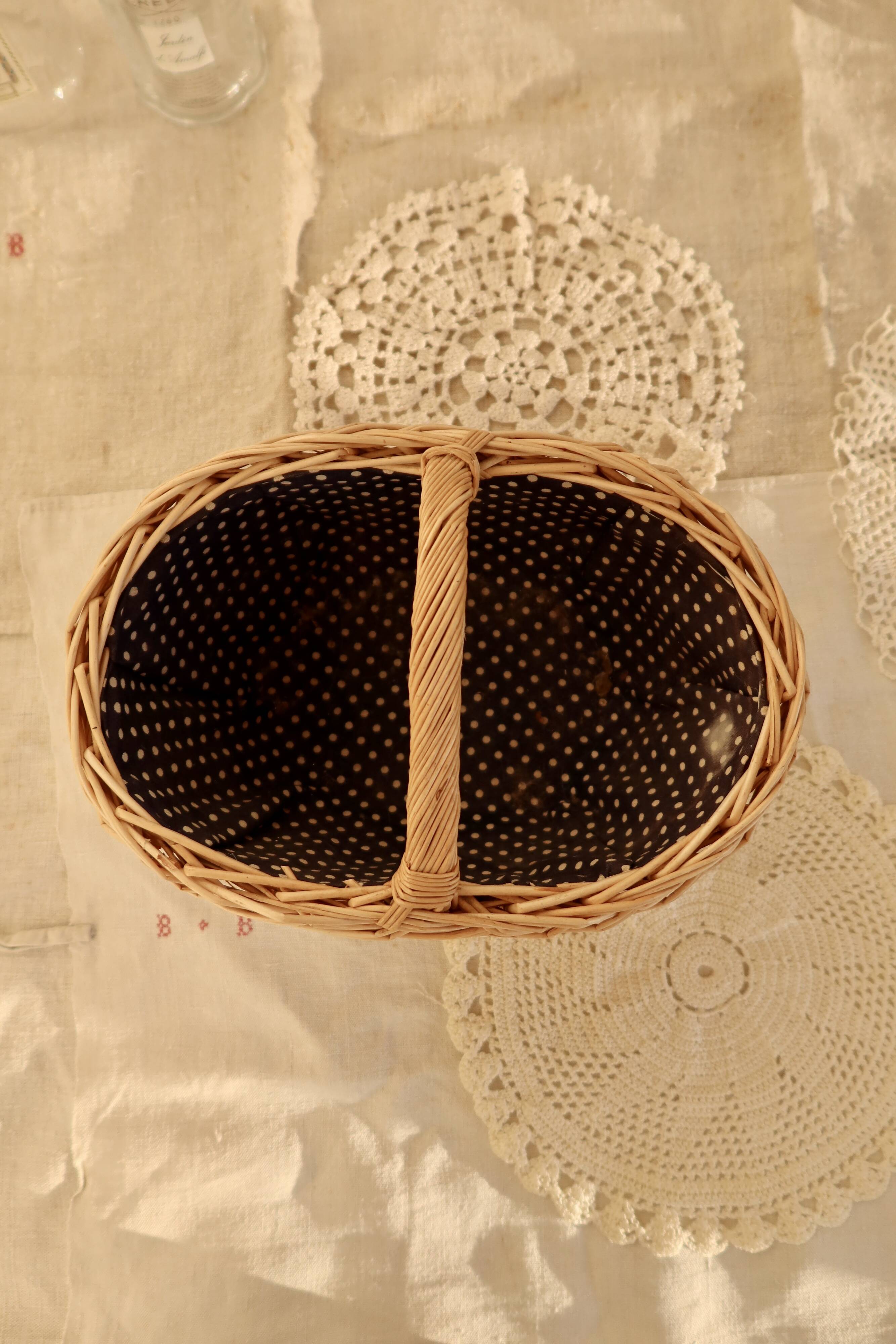 Small vintage wicker basket with navy blue lining and white polka dots - Cottage core