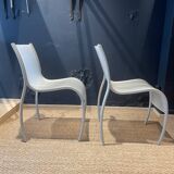 Pair of fpe chairs by ron arad for kartell translucent gray italy