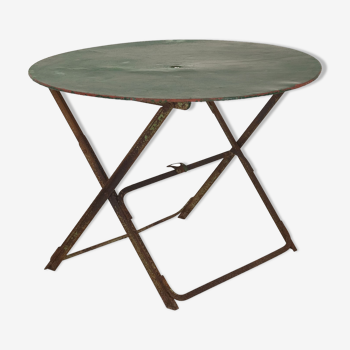 Old round garden table folding iron with rivets around 1950
