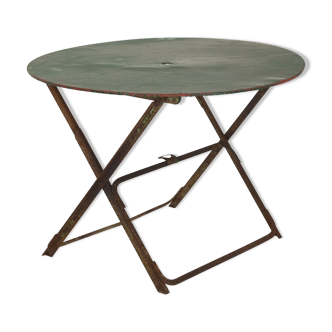 Old round garden table folding iron with rivets around 1950