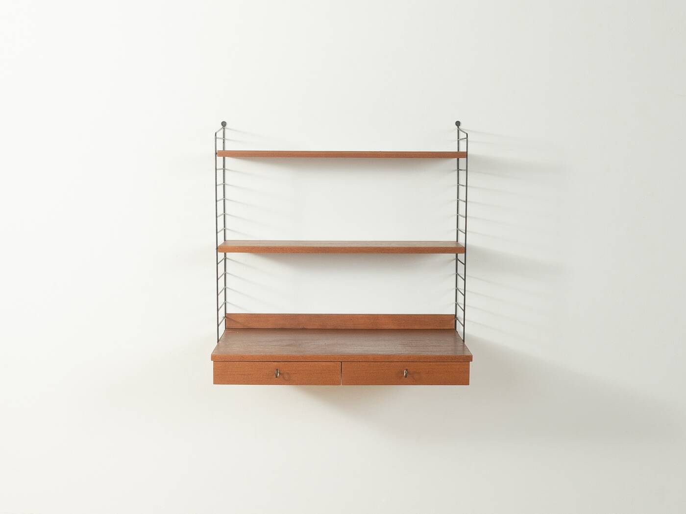 Original String shelf by Nils Strinning in teak veneer, 1949