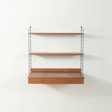 Original String shelf by Nils Strinning in teak veneer, 1949