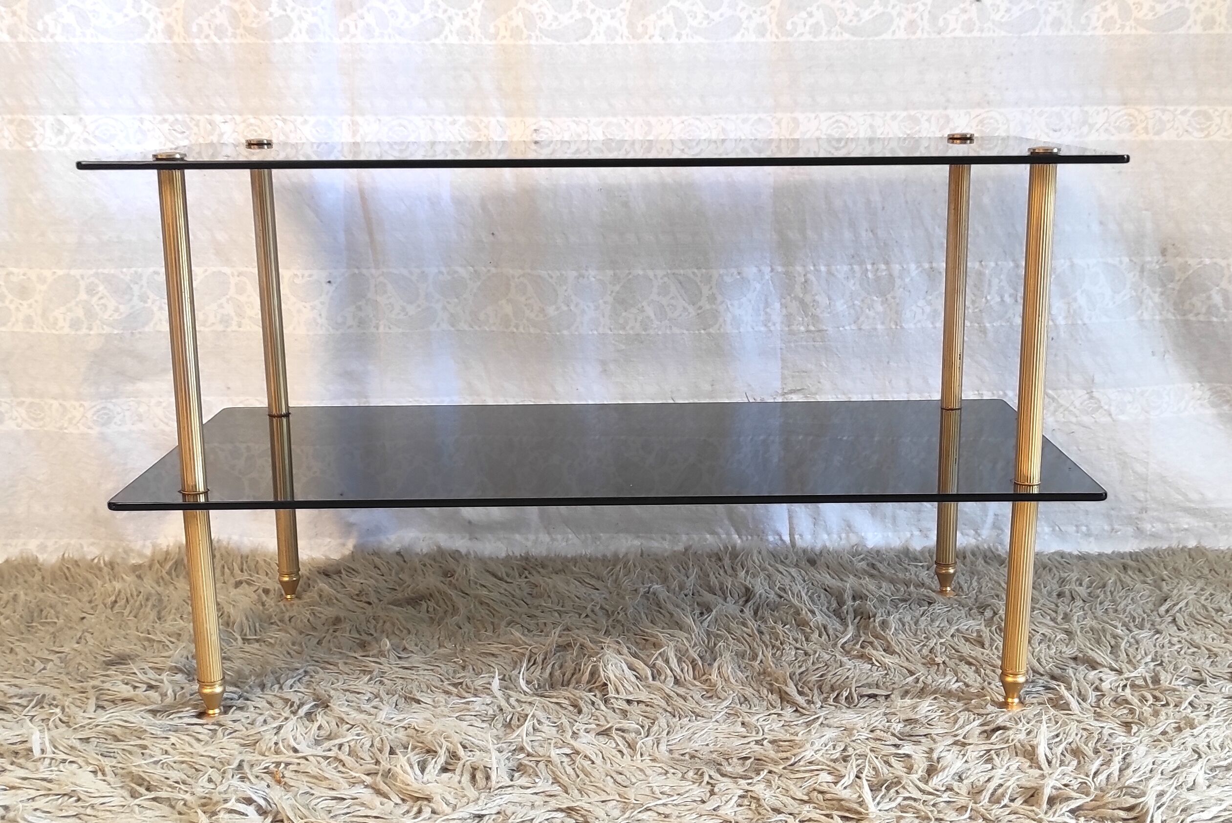 Coffee table in gilded metal and smoked glass – 60s