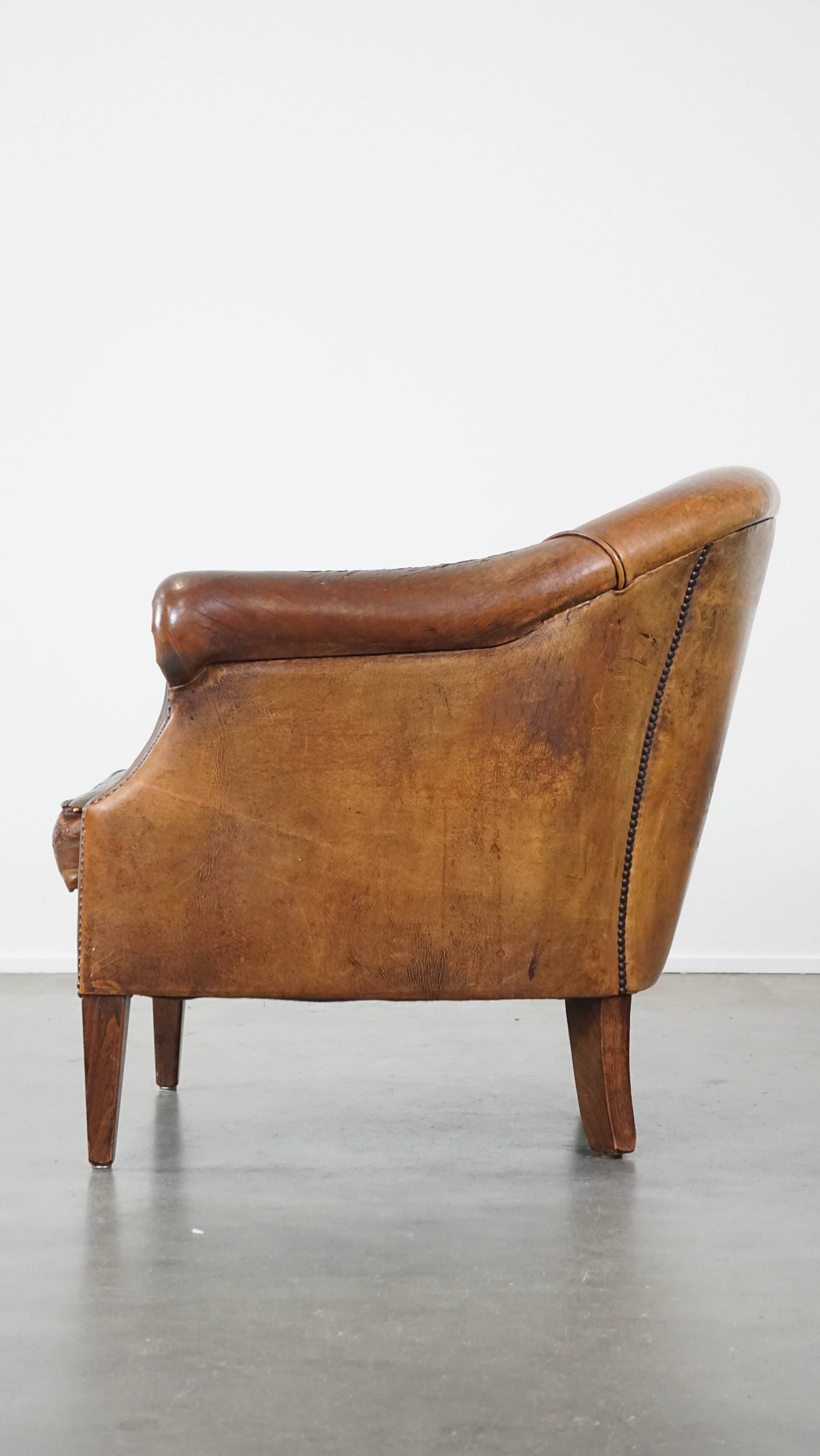 Vintage club armchair in sheepskin leather