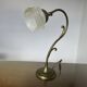 Art Nouveau lamp in brass and frosted glass