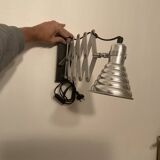 Industrial accordion wall light