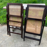 Paire de chaises pliantes , cannage , 70’
