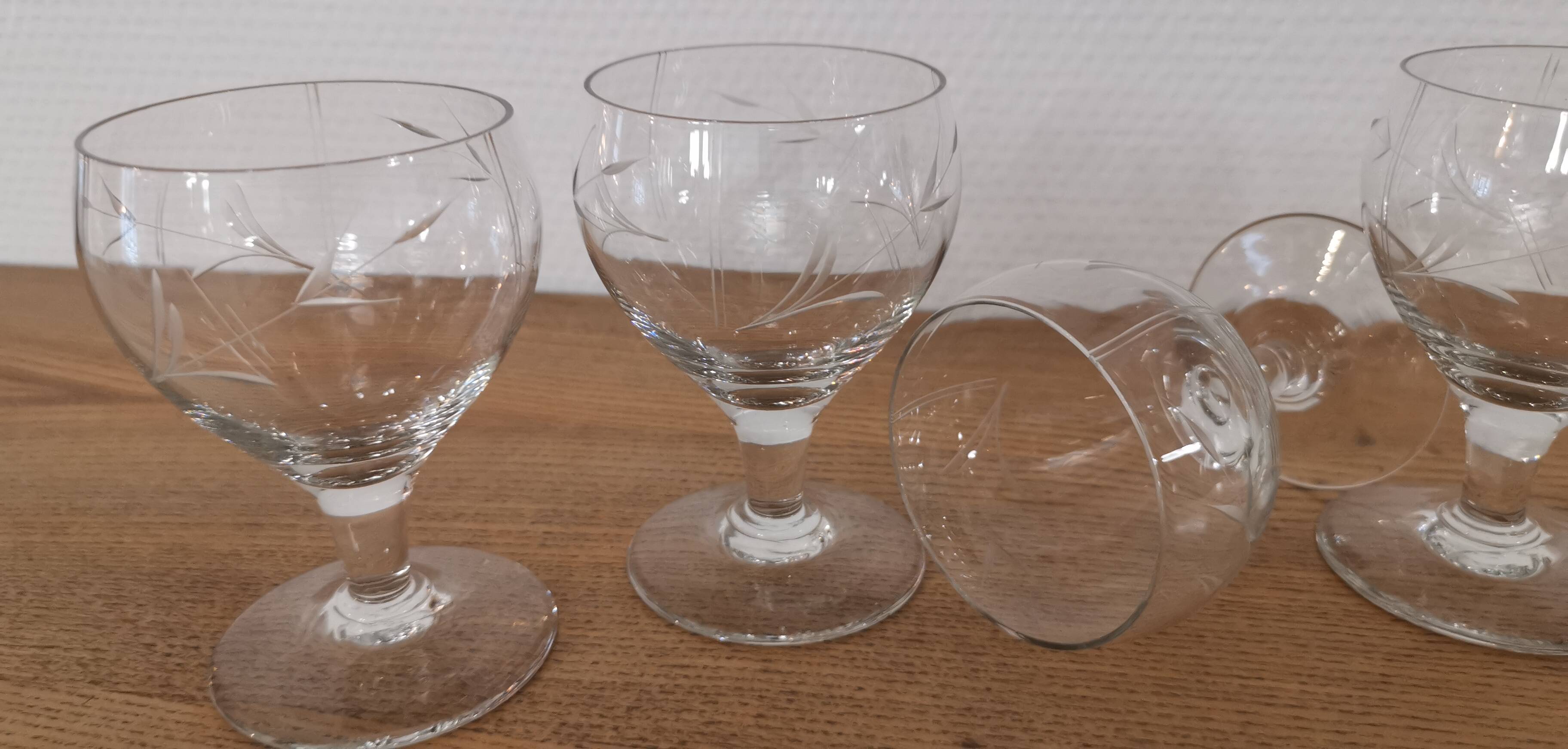 Set of 7 finely engraved vintage wine glasses